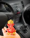 24-carat-gold-orange-titwala-ganpati-car-dashboard-8.webp